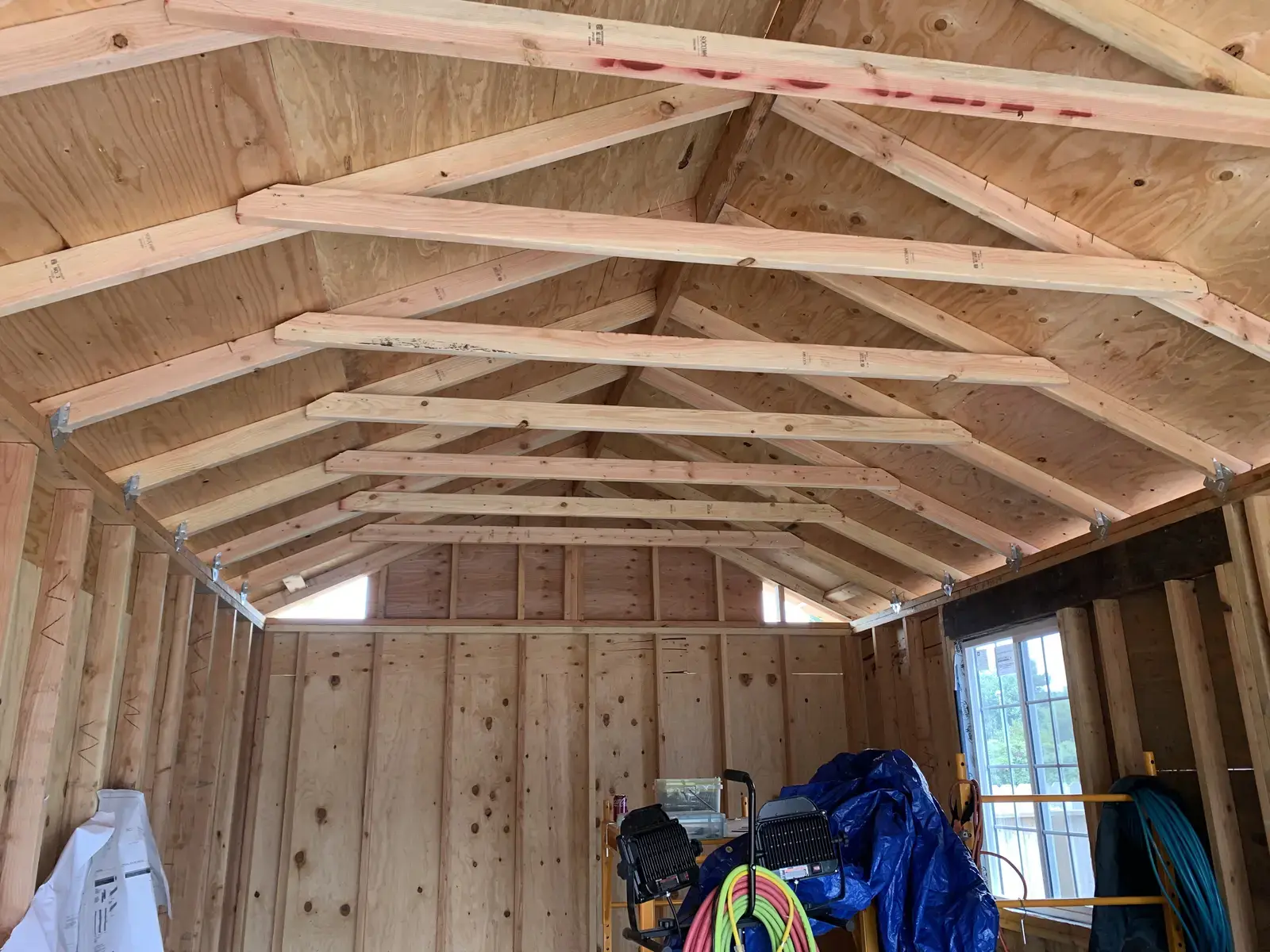 Looking up at the completed truss set inside the new detached garage