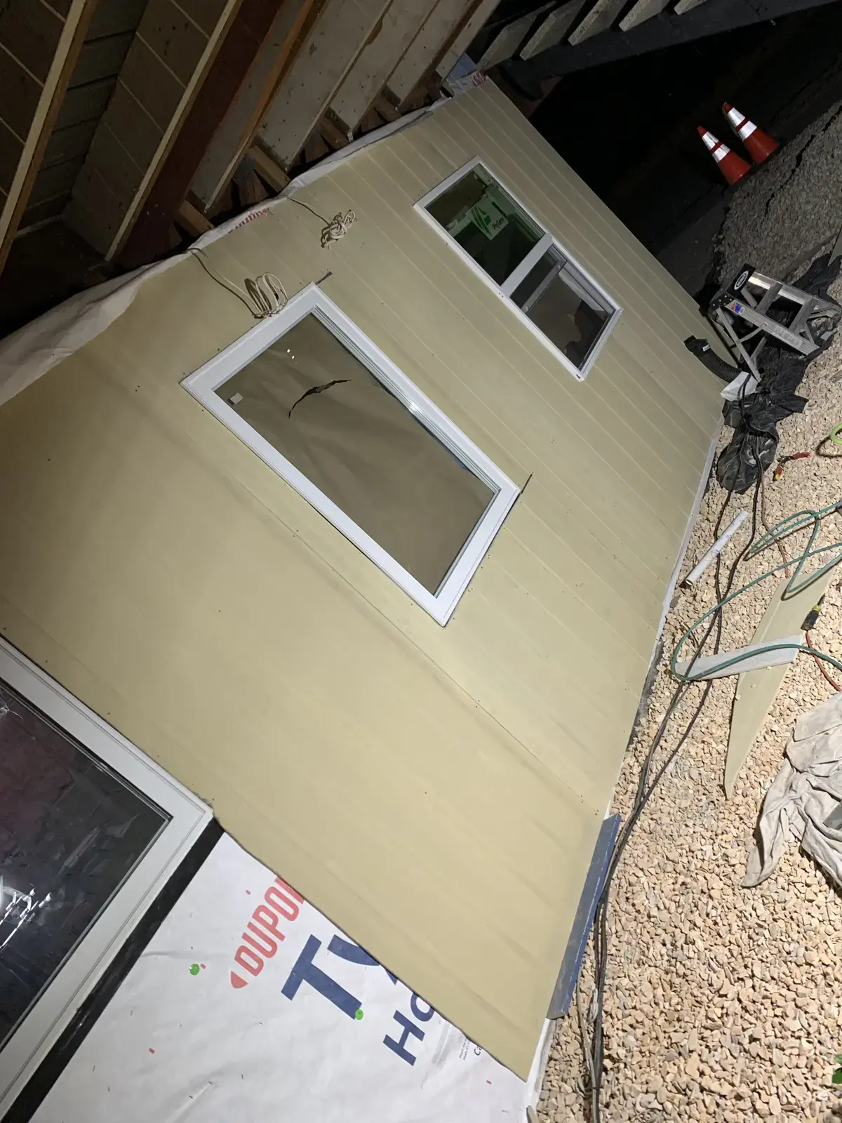New James Hardie fiber cement panel and a replacement window going on over Tyvek HomeWrap