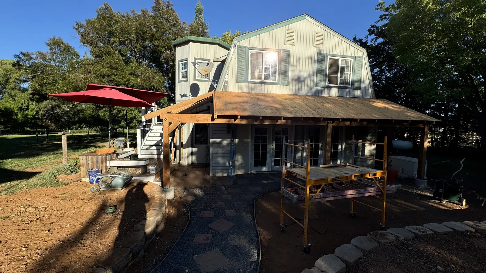 Heavy timber posts and beams with the roof deck going on