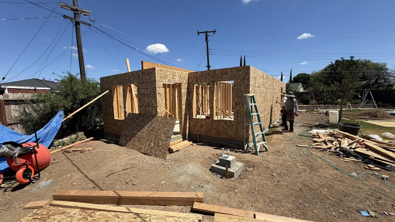 Folsom City Carpentry crew framing and sheathing exterior walls on a detached ADU in Sacramento